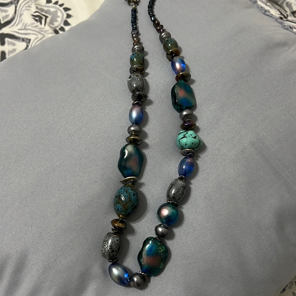 12 inches long. Chicos statement necklace. All different textured stones